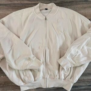 cream bomber jacket
